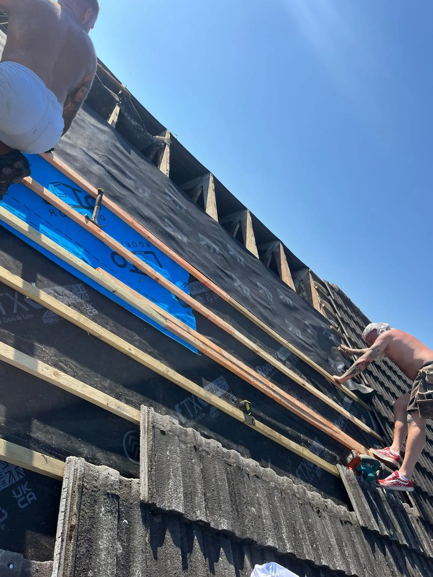 Roofing membrane and battens going on